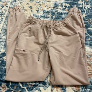 Pink jaanuu jogger scrub bottoms in size small tall. Hardly worn